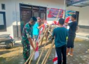 Semangat Kebersamaan: Babinsa, Bhabinkamtibmas, dan Mahasiswa KKN Pasang Bendera HUT RI ke-79