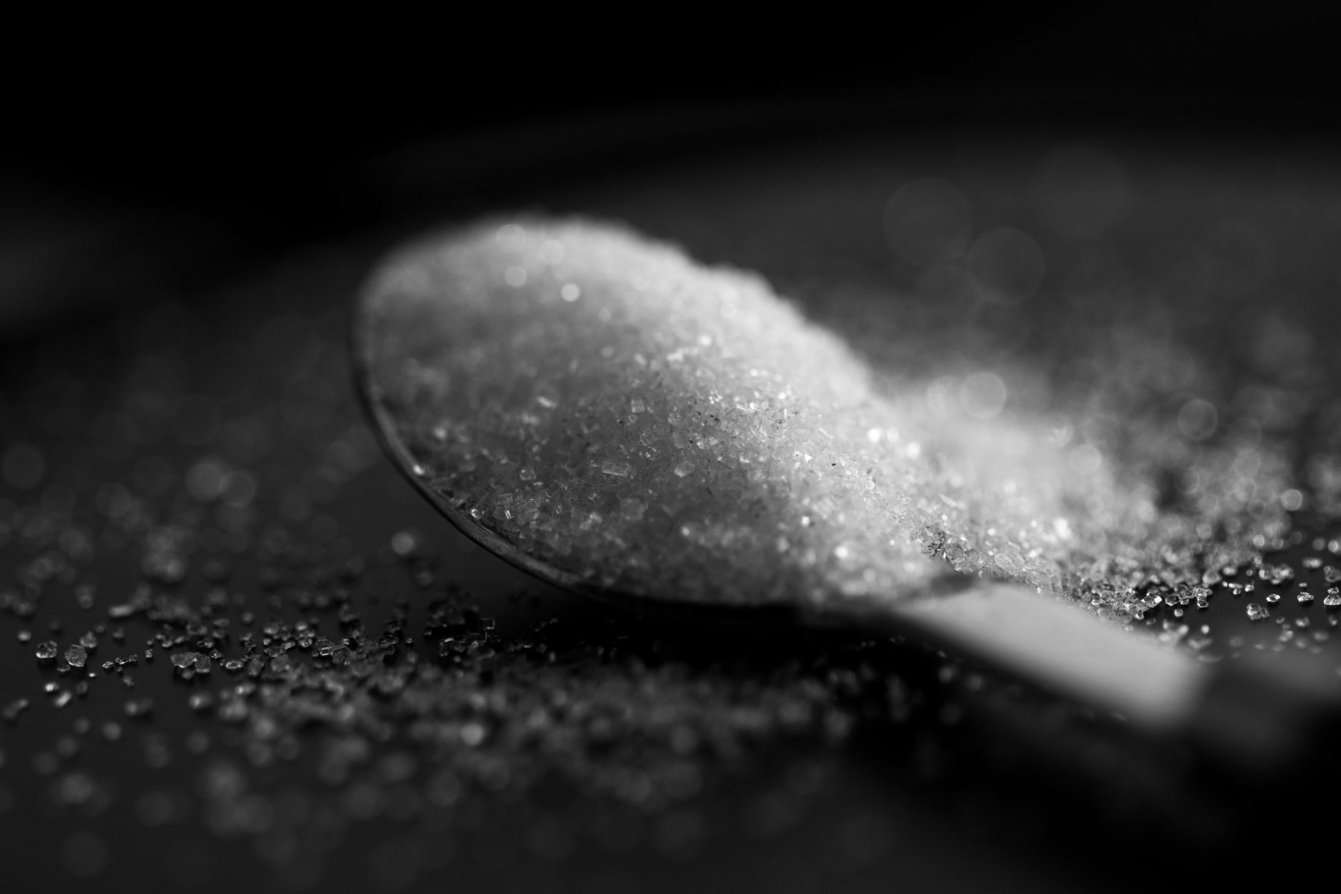 Teks "Kurangi Gula" untuk pencegahan diabetes.