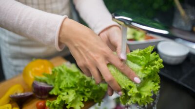 Fresh vegetables and fruits arranged on a table to illustrate clean eating for a healthy immune system.